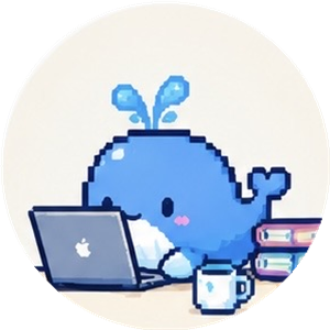 かくいのアイコン（パソコンに向かうクジラ）